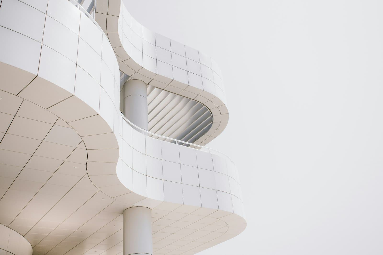 White modern architecture against a pale sky